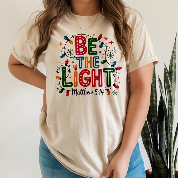 Women Christmas Shirt Be the Light Matthew Christian Tee Unisex Gift - Picture 1 of 2